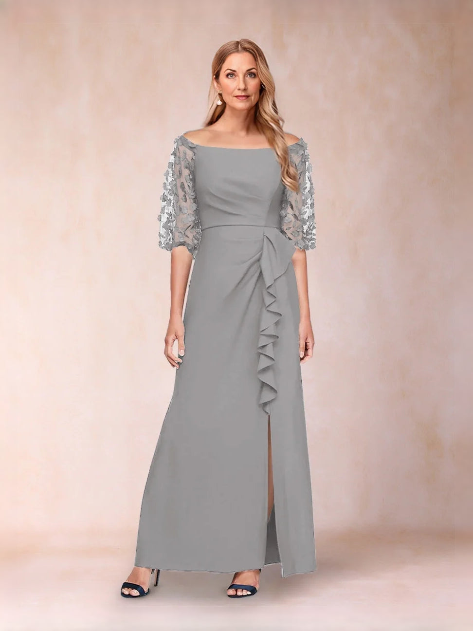 Off-shoulder light gray formal gown with lace sleeves and side-slit ruffle skirt detail
