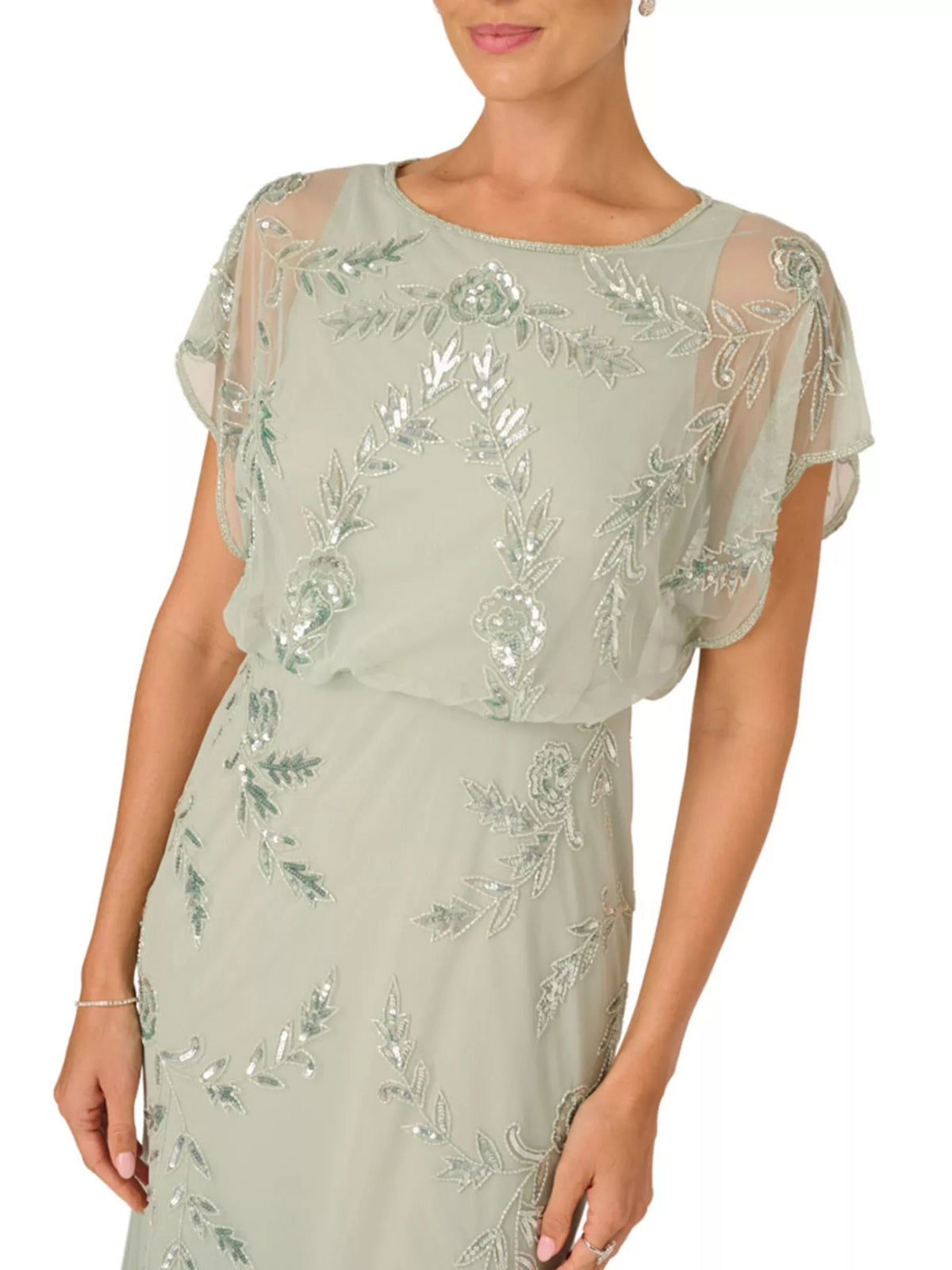 Sage green beaded round-neck sheath maxi dress, close-up of embellished bodice
