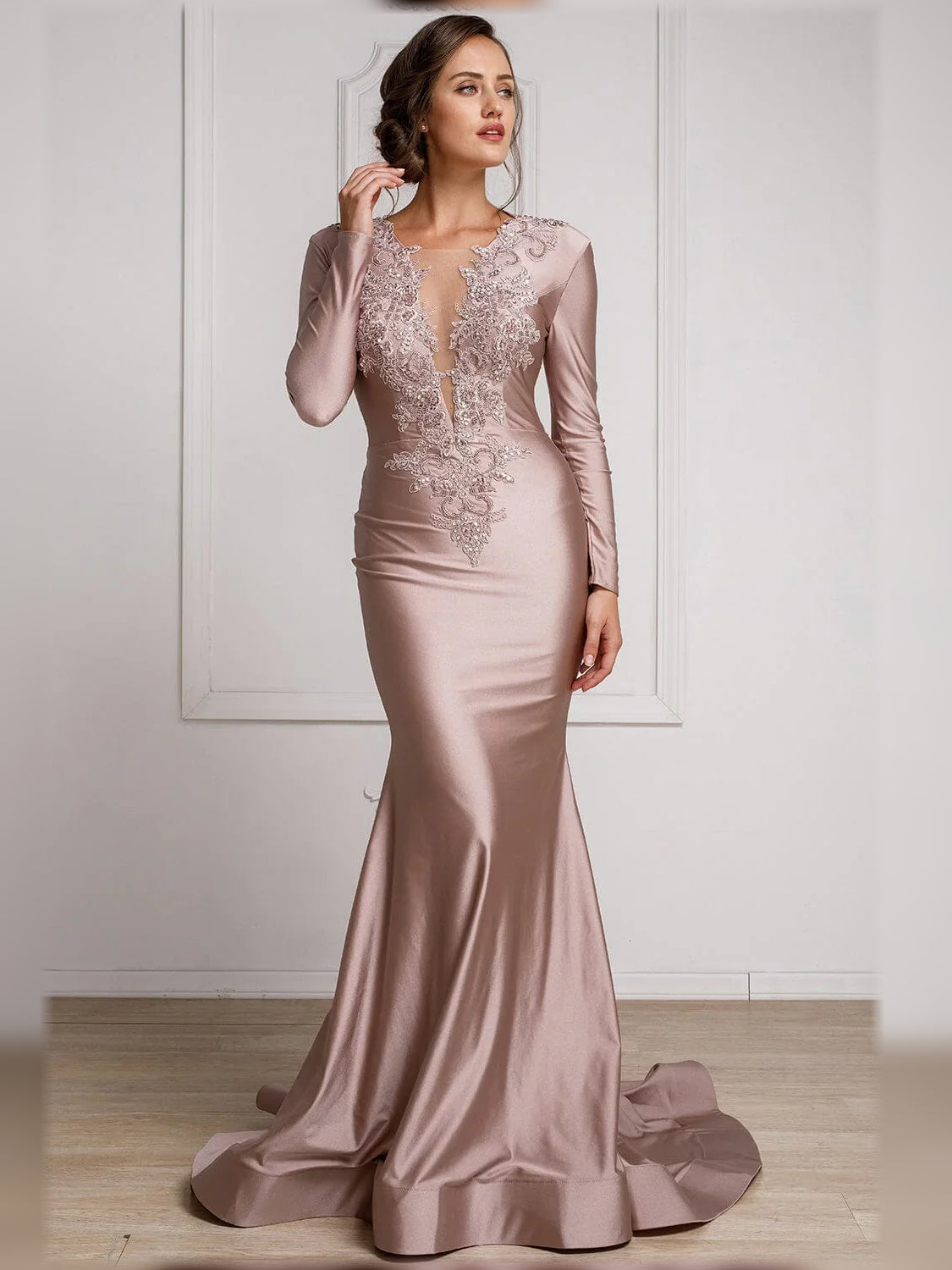 Dusty rose long-sleeve formal dress with beaded V-neck bodice and mermaid skirt, floor-length.