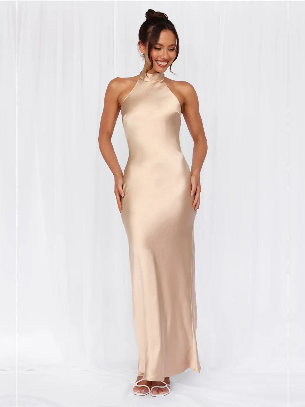 Champagne sheath maxi formal dress with halter neckline, alternate view showing the hem