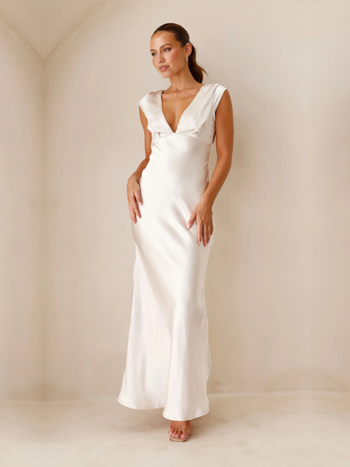Champagne sheath maxi formal dress with V-neckline, alternate view showing the hem