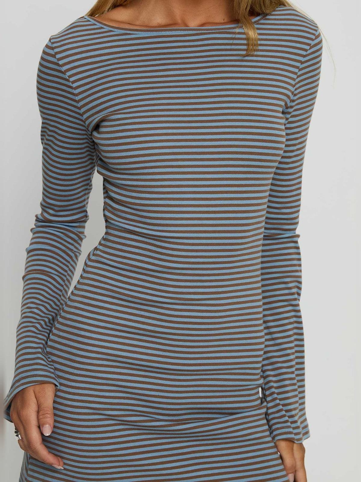 Close-up of blue-and-white striped long-sleeve mini dress back with round neckline