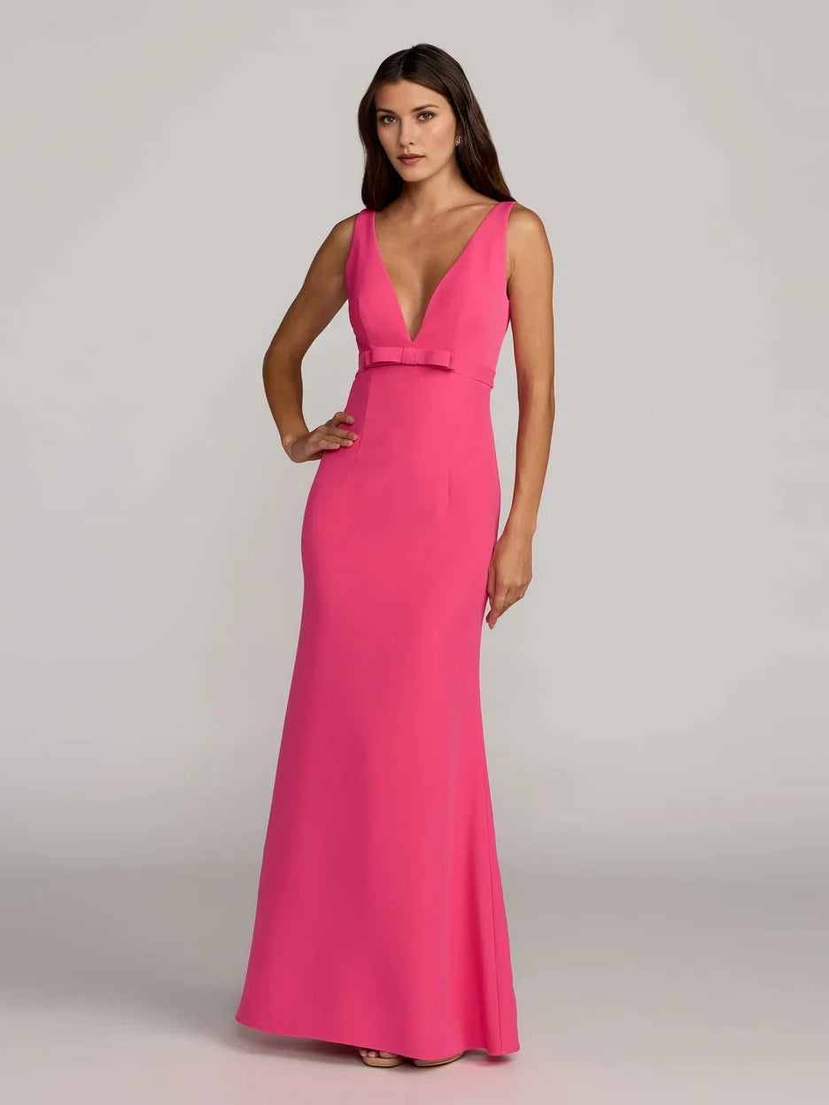 Fuchsia V-neck sleeveless mermaid formal dress, floor length with waist belt detail.