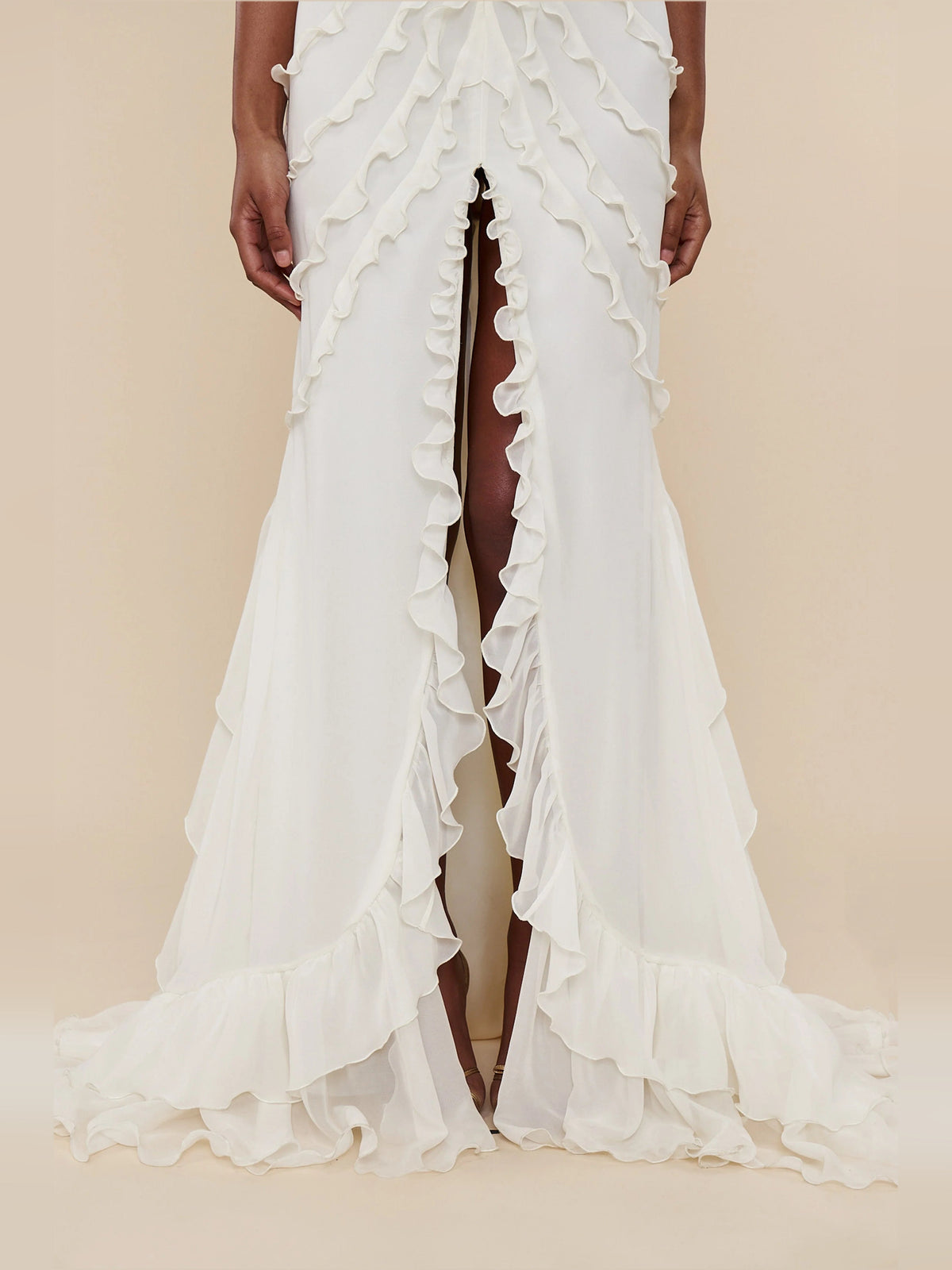 Ivory mermaid prom dress with layered ruffled panels and side slit