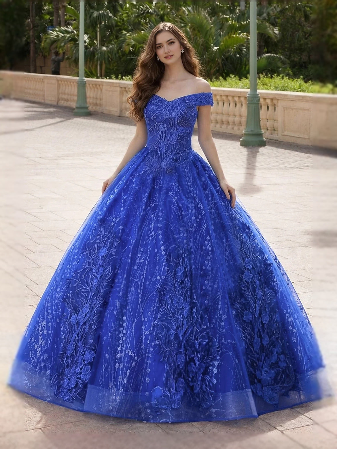 Royal blue off-shoulder embroidered tulle ball gown with voluminous skirt, floor length