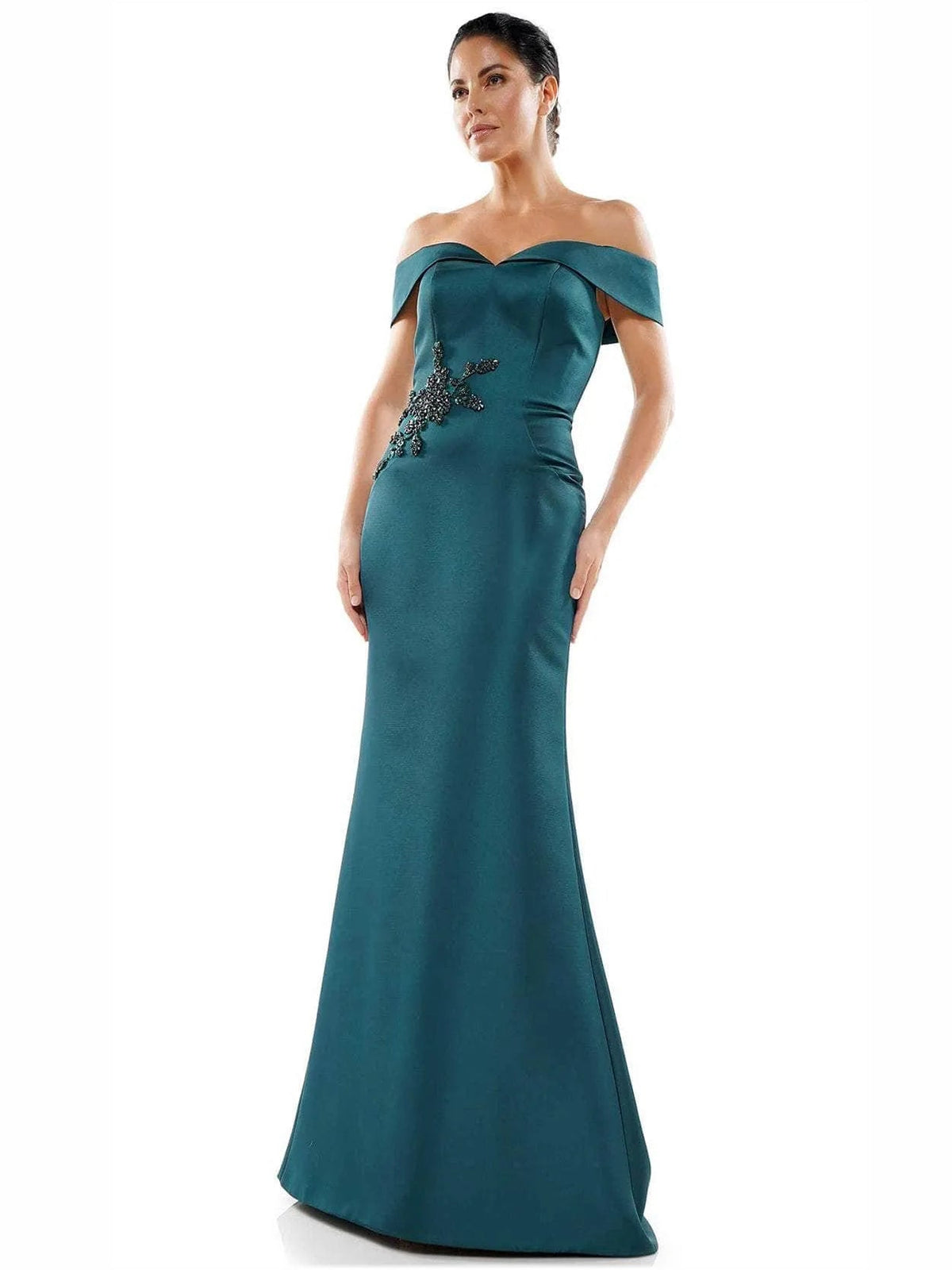 Teal off-shoulder mermaid formal dress with beaded neckline motif and floor-length skirt.