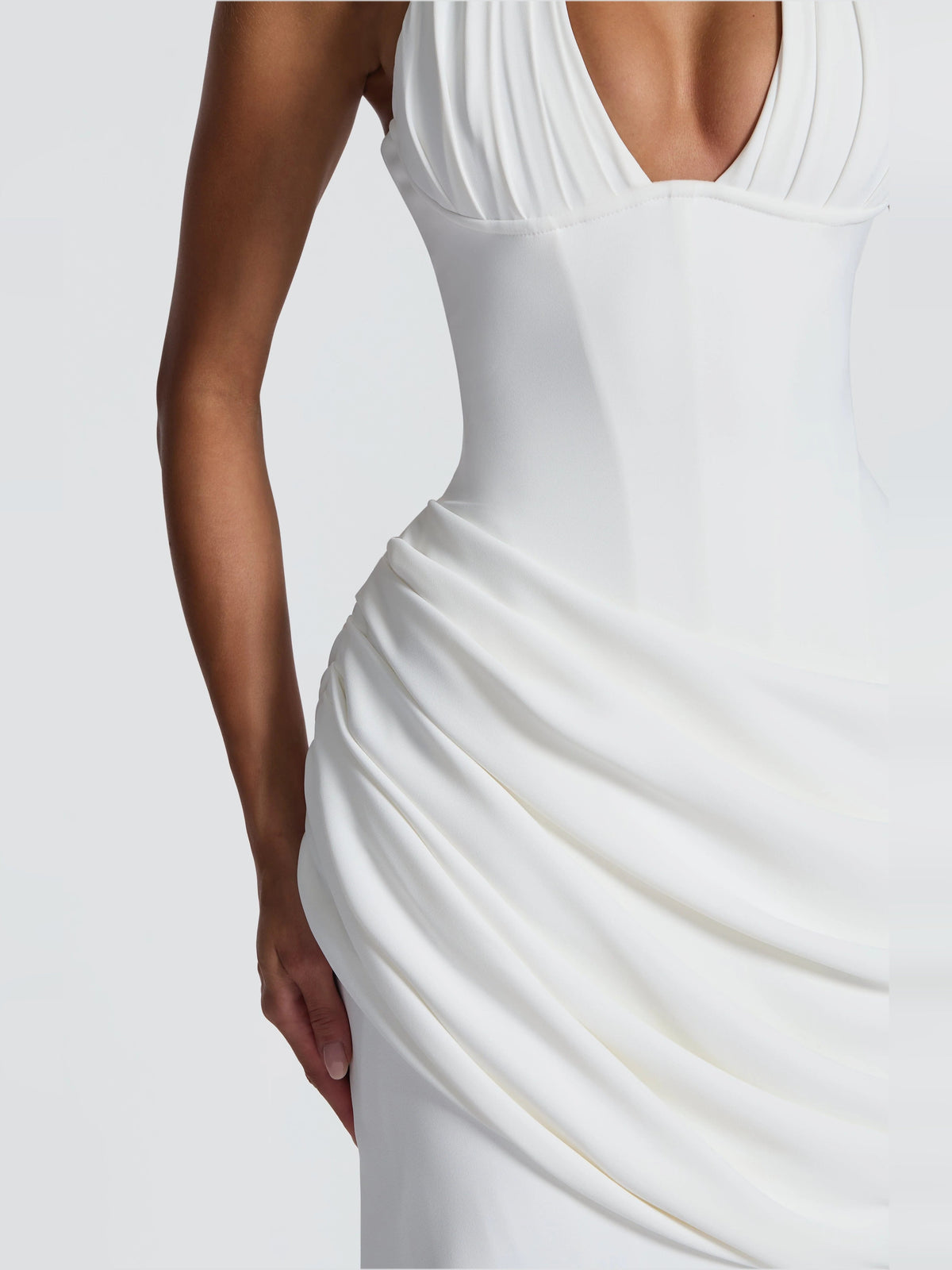 Ivory draped pleated mermaid wedding dress detail, ruched waist on fitted skirt