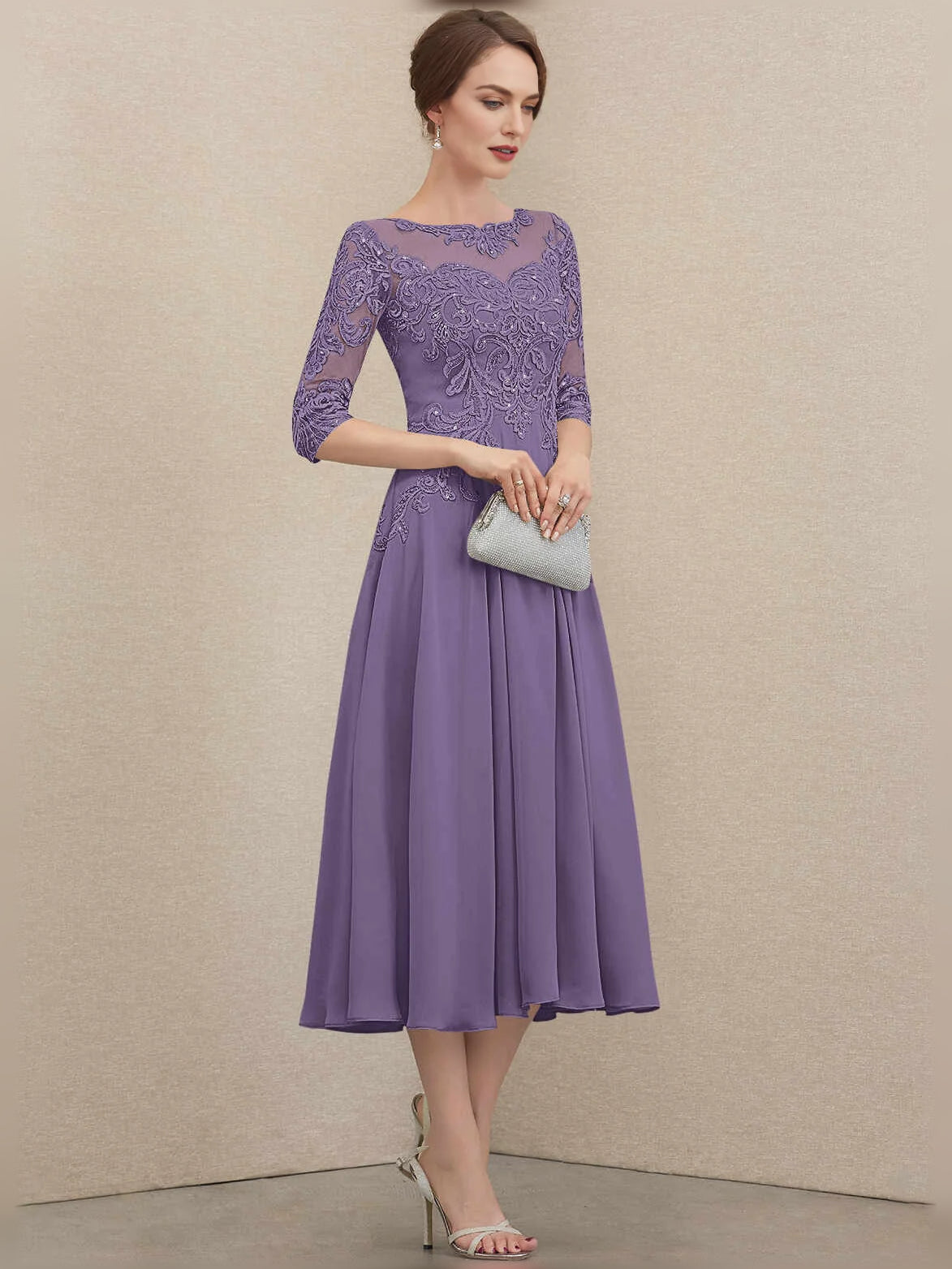 Lavender pleated chiffon A-line mother-of-the-bride dress with lace illusion neckline, 3/4 view
