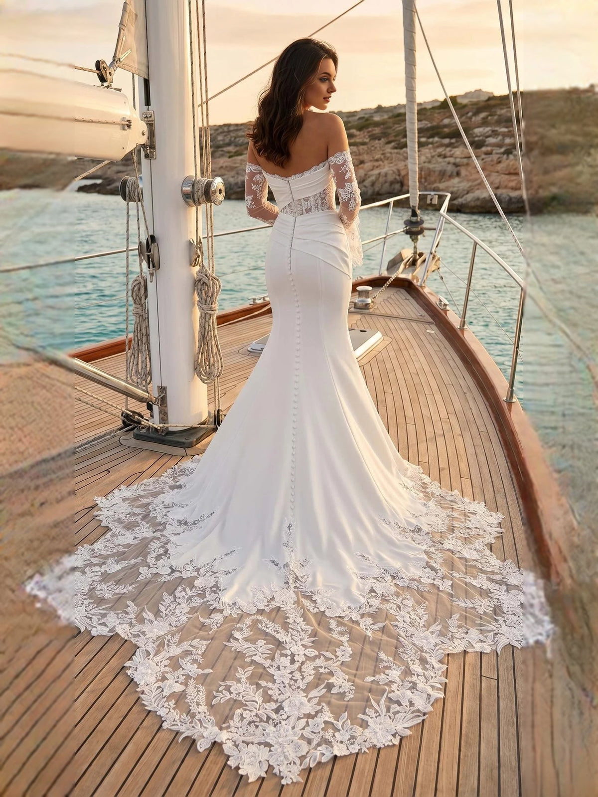Ivory off-shoulder mermaid wedding dress with lace sleeves and long lace train