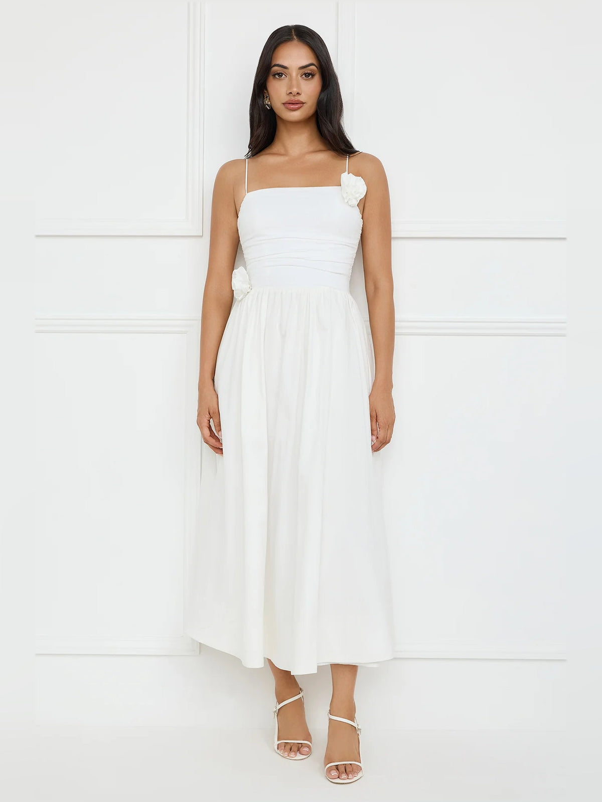 White a-line maxi formal dress with floral appliqué, alternate view showing the hem
