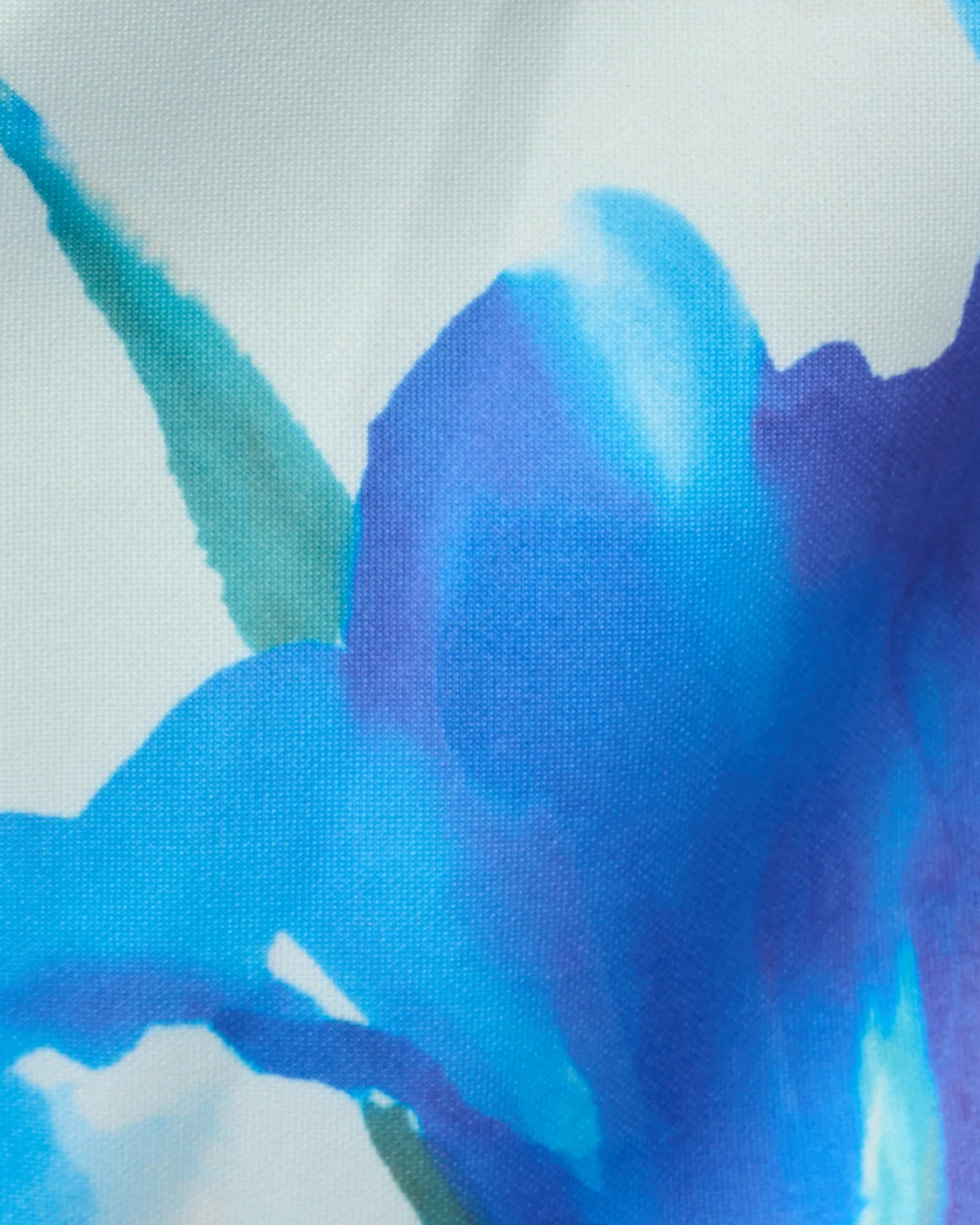Close-up of blue floral print fabric texture