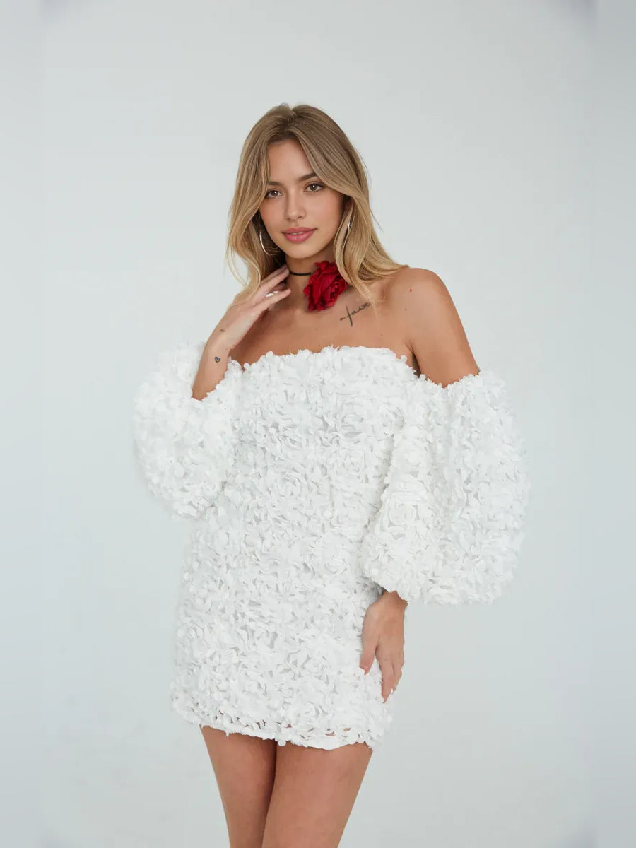 White off-shoulder bodycon mini dress with floral ruffle texture and red neck accent