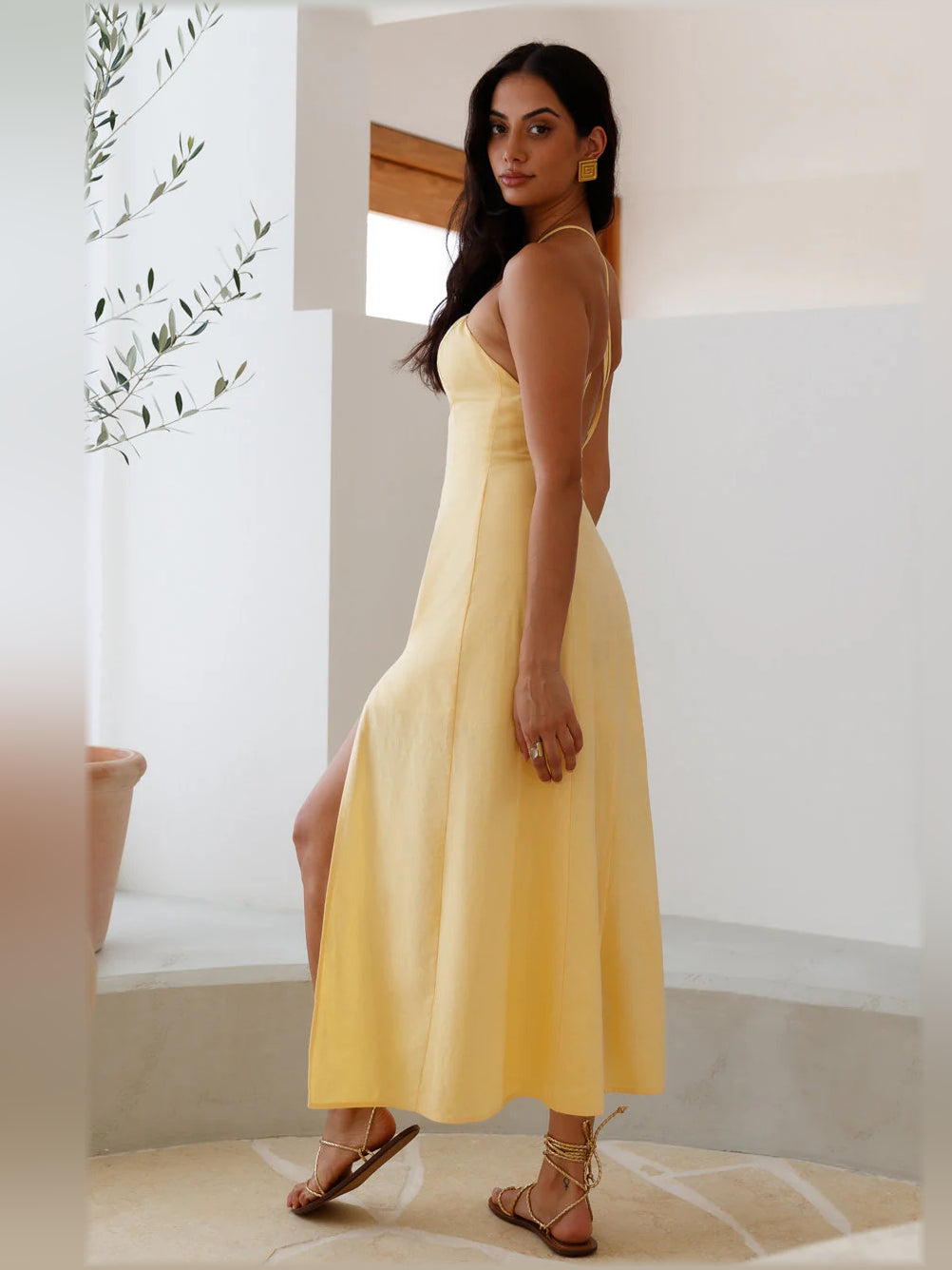 Yellow midi formal dress with open back and side slit, thin tie straps