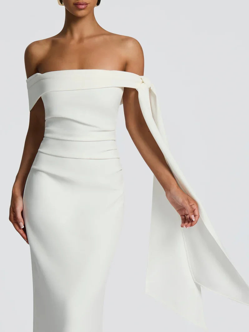 White off-shoulder sheath maxi dress with tied bow detail at neckline