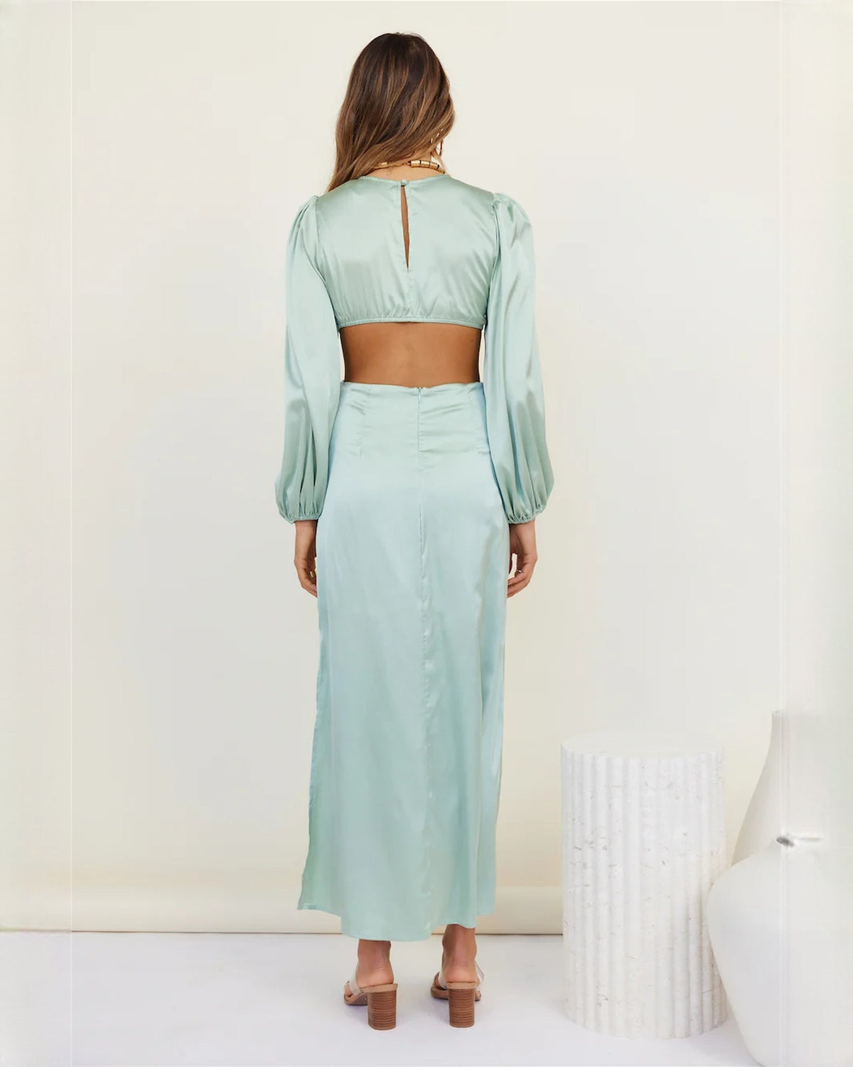 Mint satin maxi dress from back, open back cutout and long puff sleeves
