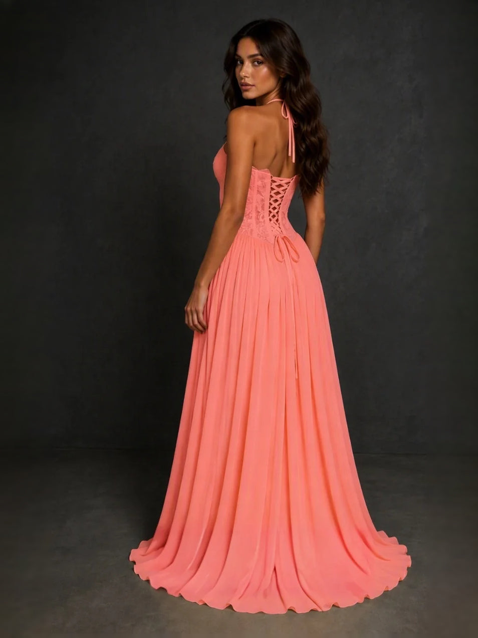 Coral sweetheart A-line prom dress with lace bodice and pleated floor-length skirt