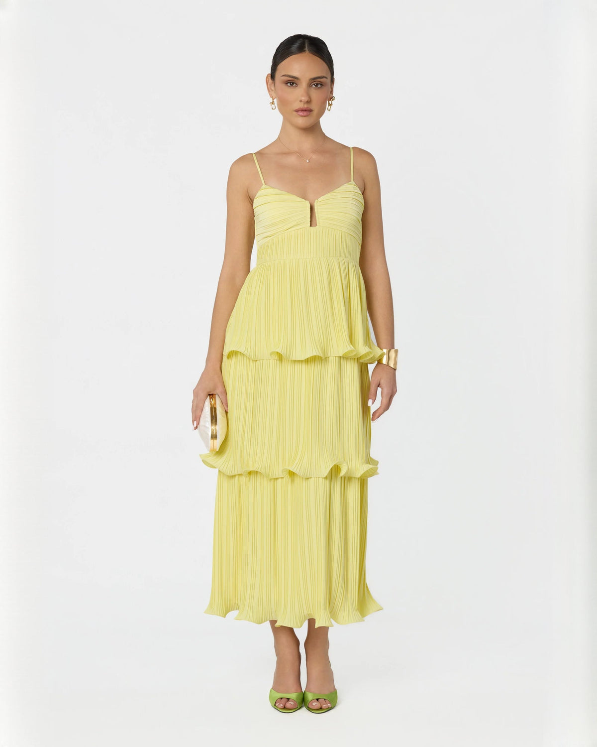 Light yellow sleeveless tiered maxi dress front view with pleated bodice and ruffles
