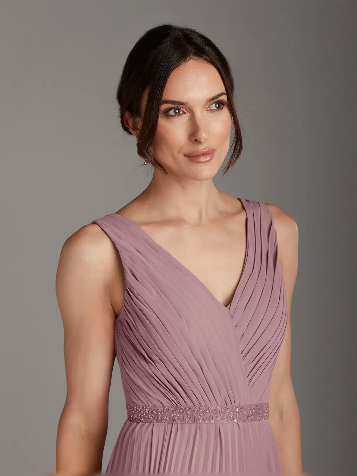 Dusty rose pleated chiffon V-neck maxi dress close-up, beaded waist detail