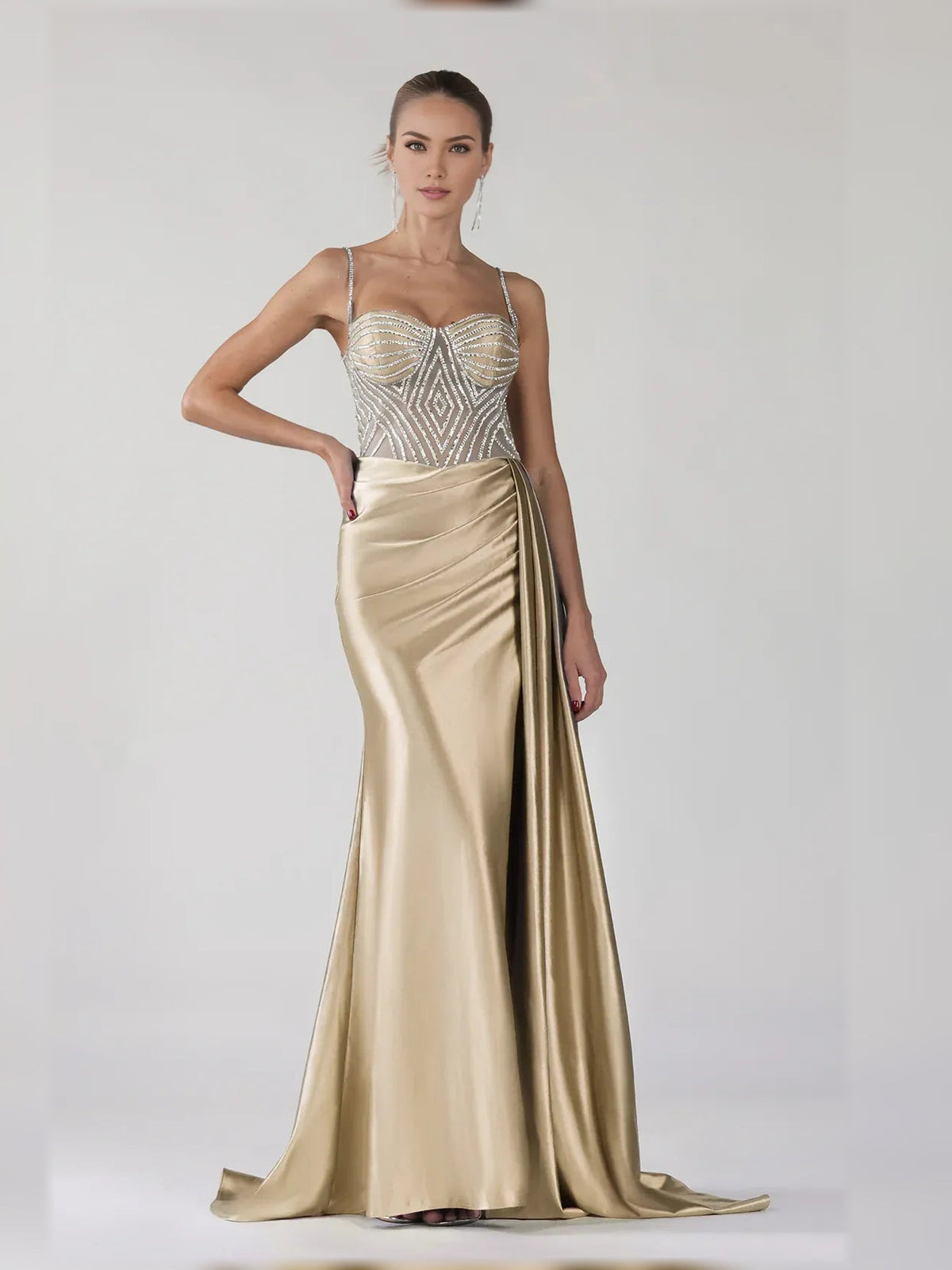 Champagne satin formal dress with sweetheart bodice, spaghetti straps, and side slit