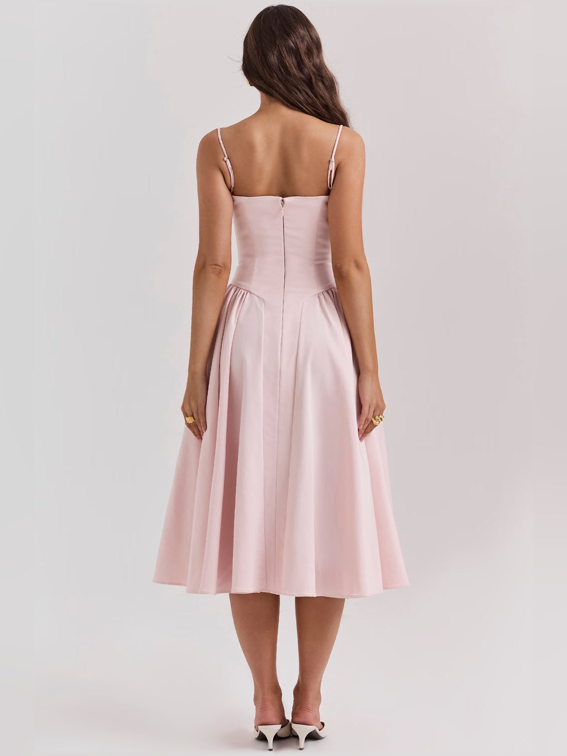 Pink corset midi dress back view with fitted bodice and pleated skirt