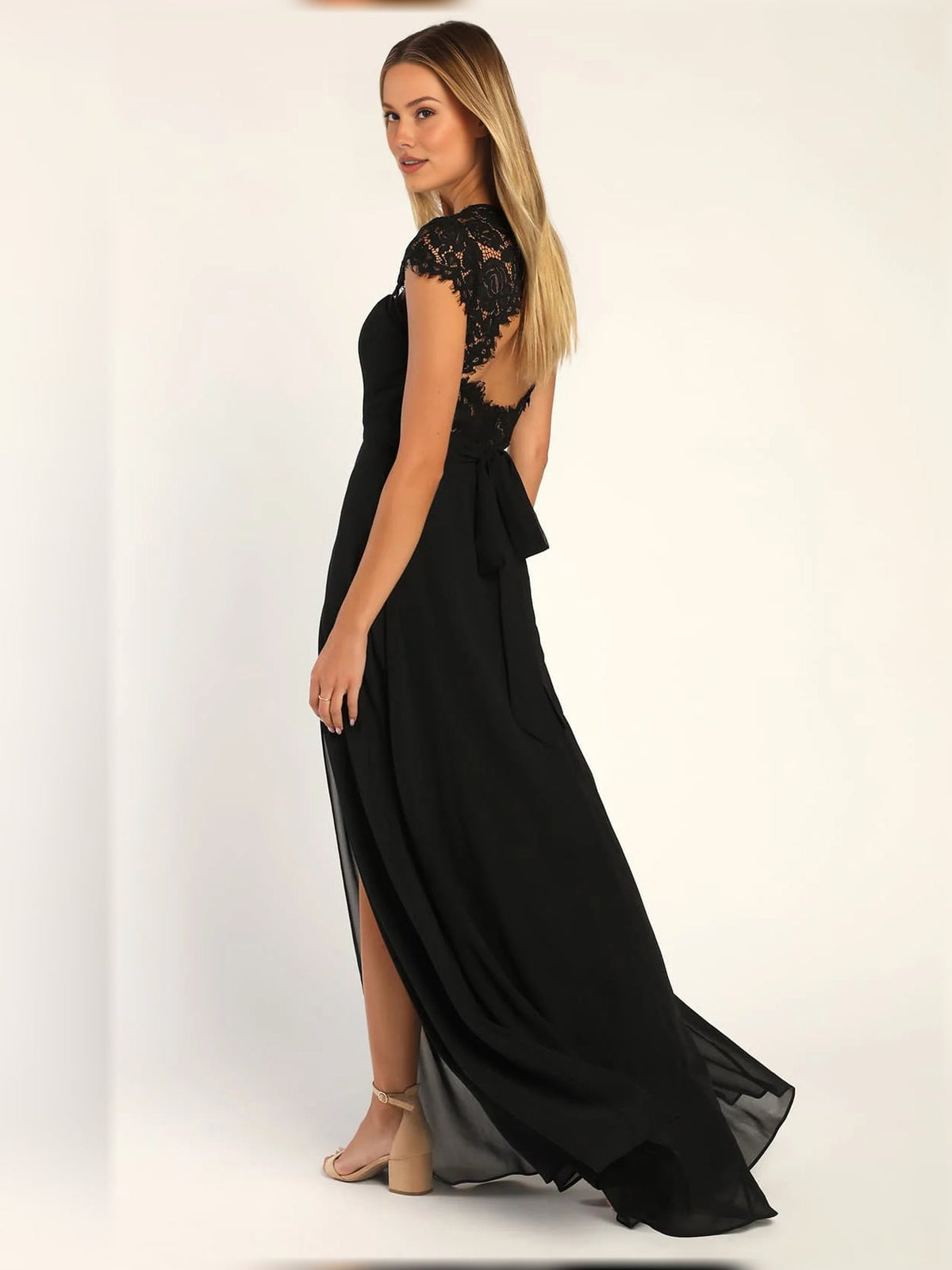 Black A-line maxi dress with lace cap sleeves and front slit
