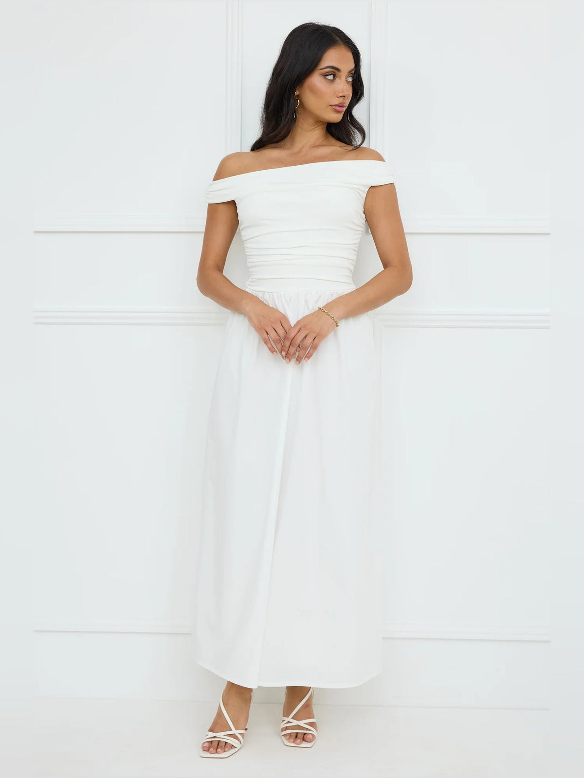 White a-line maxi formal dress with off-the-shoulder neckline, alternate view showing the hem