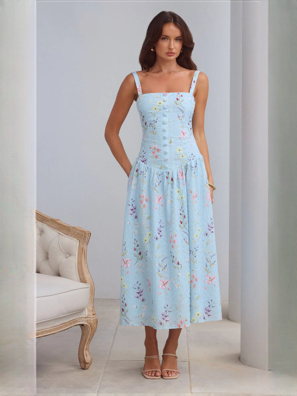 Blue a-line maxi formal dress with floral print, alternate full-length view showing the hem
