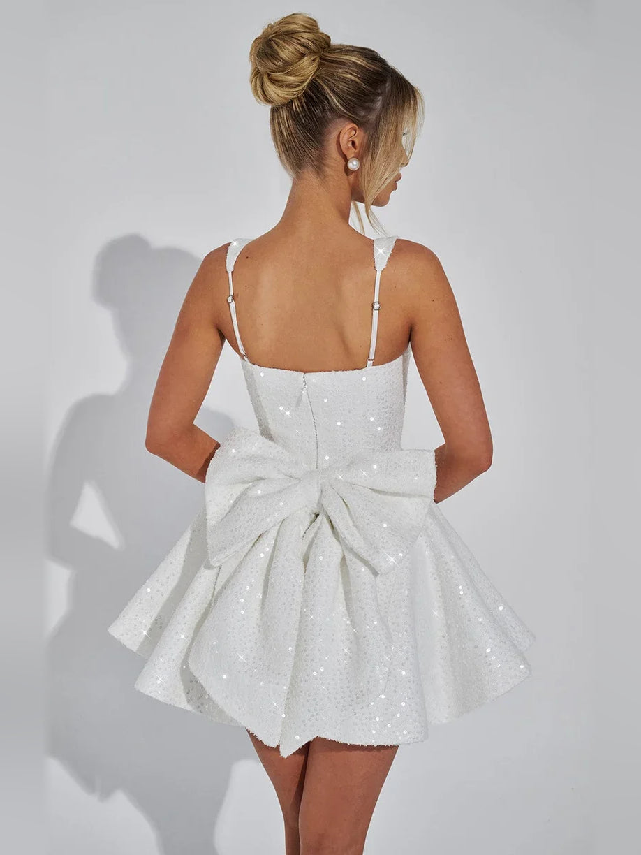 White sequin square-neck A-line mini dress with open back and bow detail