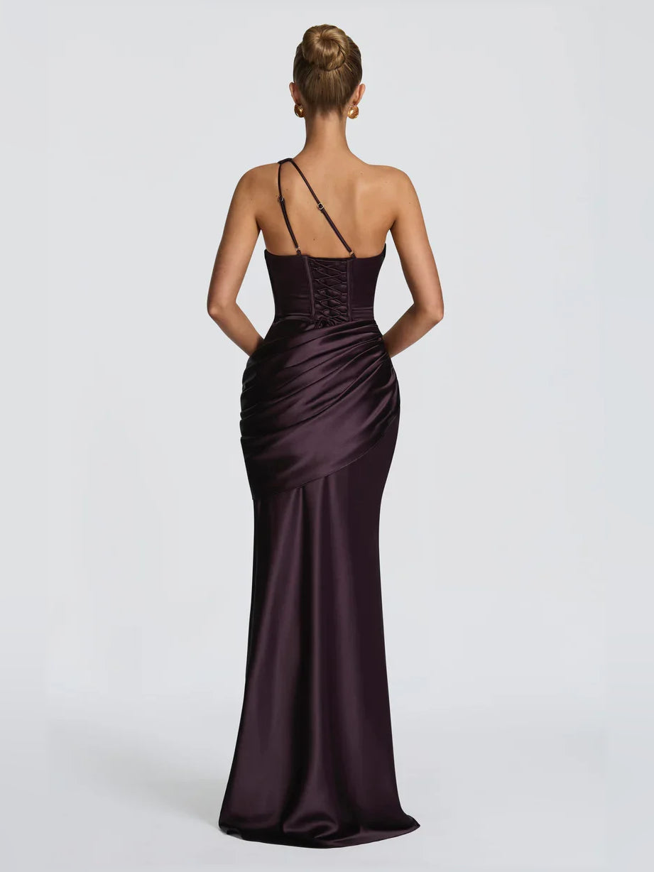 Plum one-shoulder corset dress with strappy back and ruched floor-length silhouette