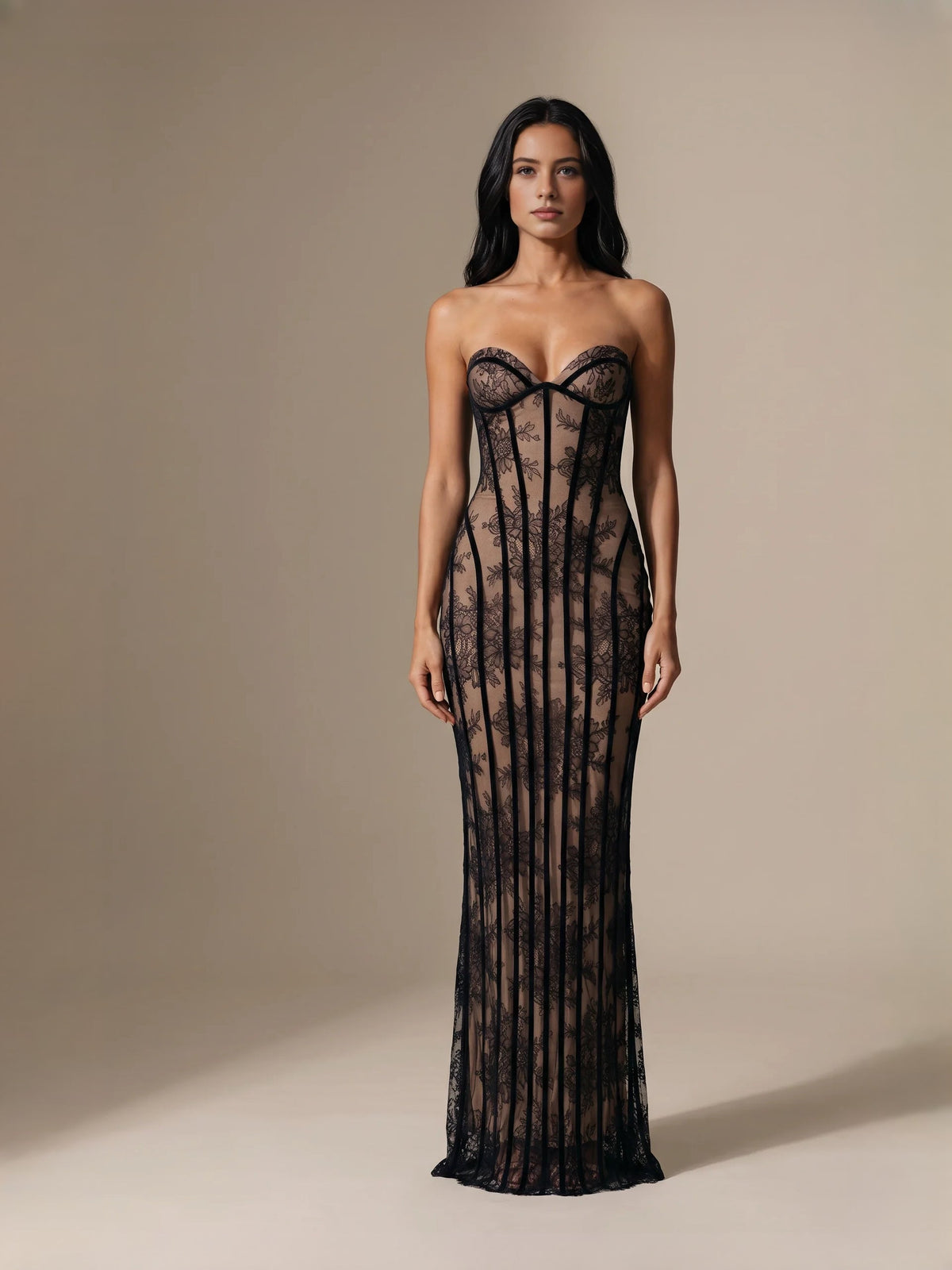 Black strapless corset mermaid gown with sheer lace texture and floor length