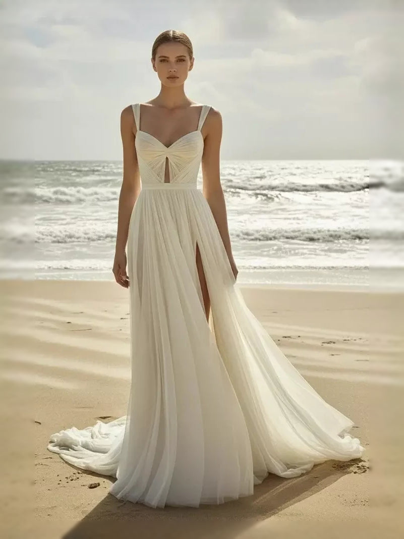 Ivory chiffon A-line wedding dress with sweetheart neckline, draped waist, long floor length