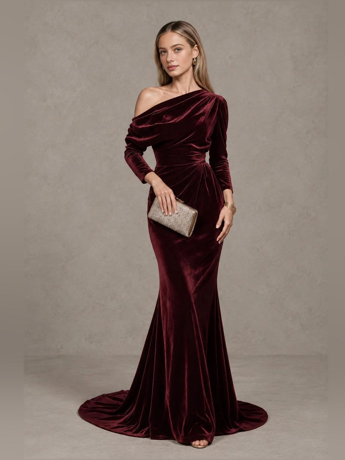 Burgundy velvet one-shoulder mermaid gown with draped bodice and long sleeves