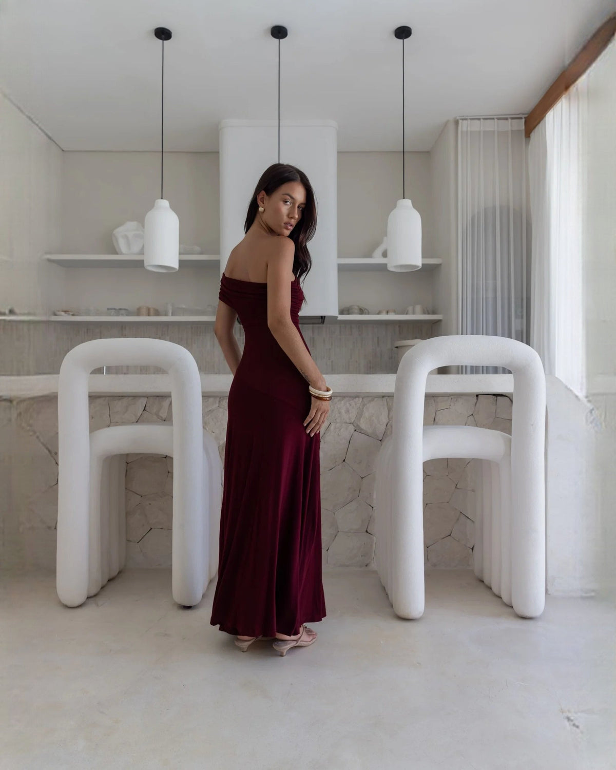 Wine red off-shoulder A-line maxi bridesmaid dress with side drape and ring detail