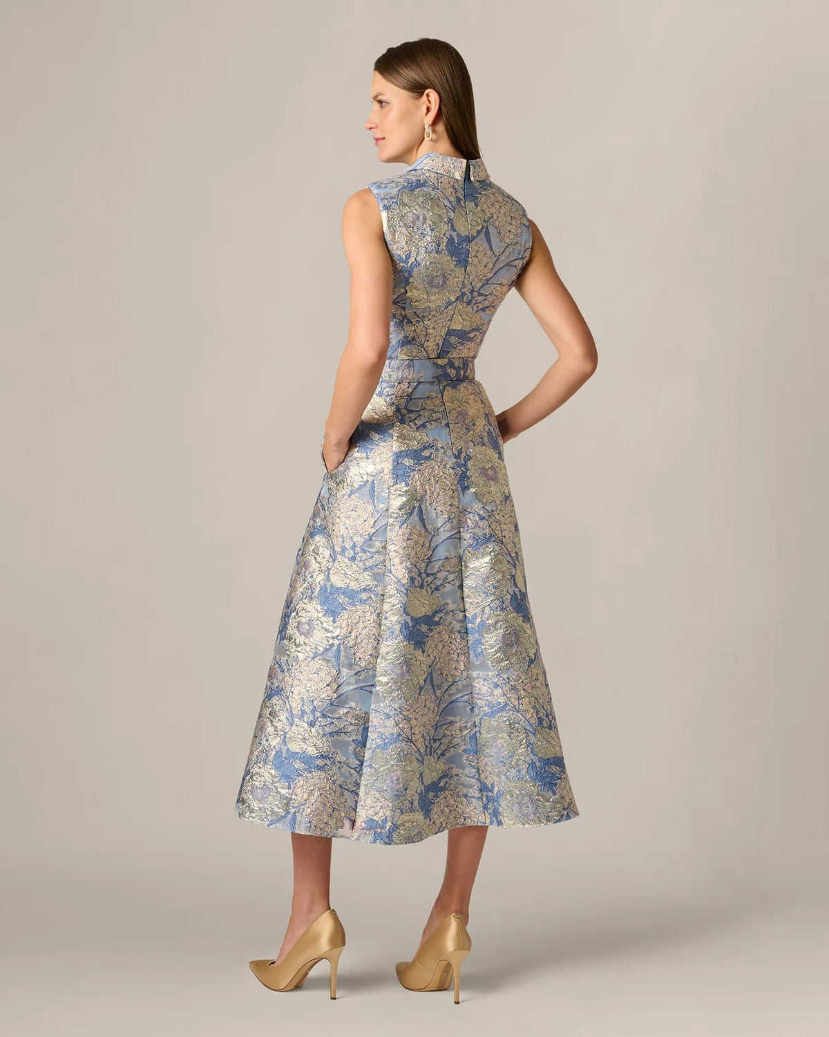 Blue floral sleeveless A-line midi dress, back profile with waist belt