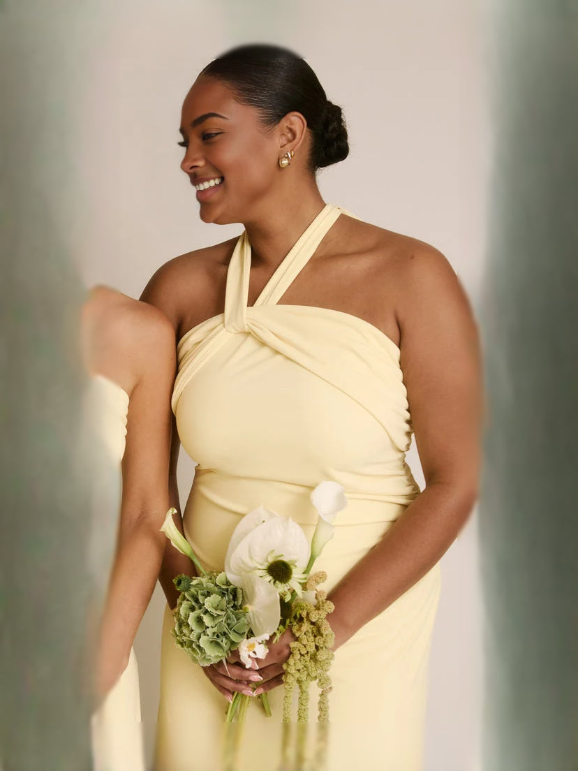 Lemon yellow halter sheath dress with twisted neckline and gathered waist