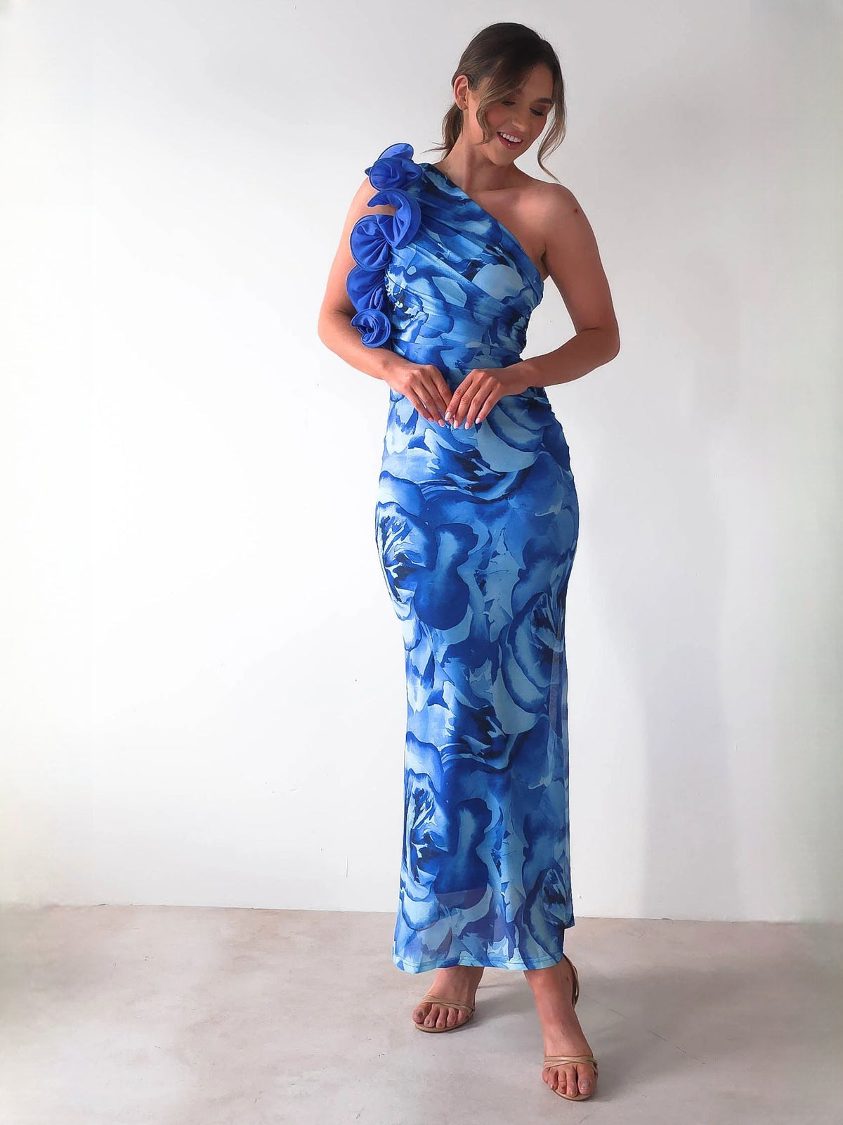 Blue sheath maxi formal dress with ruffle details, alternate full-length view showing the hem