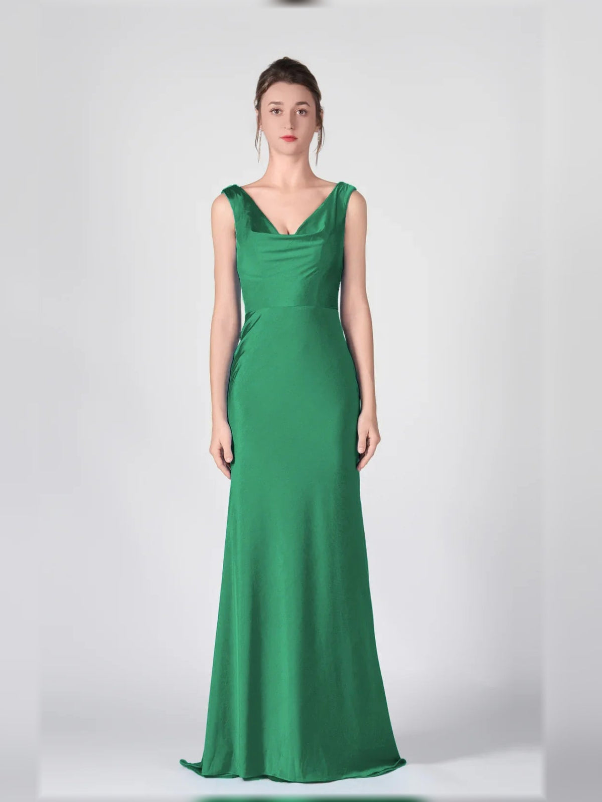 Green sleeveless V-neck mermaid formal dress with fitted waist and flowing floor length