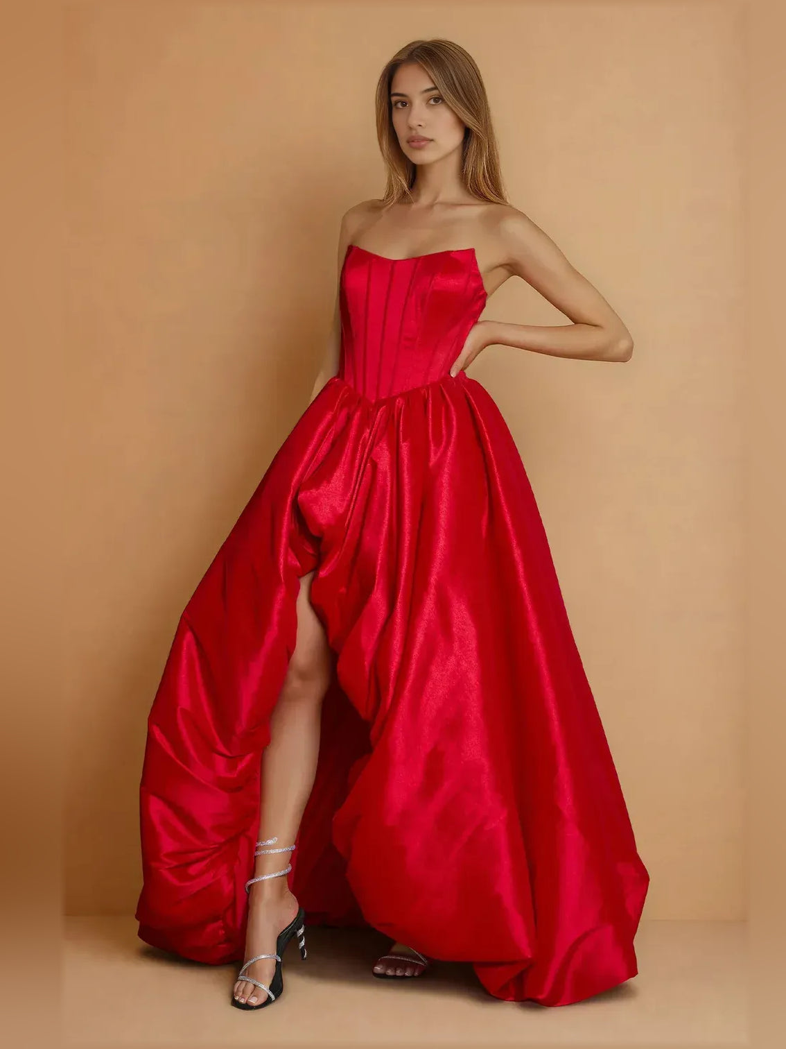 Red strapless corset formal dress with gathered ruffle skirt and side slit