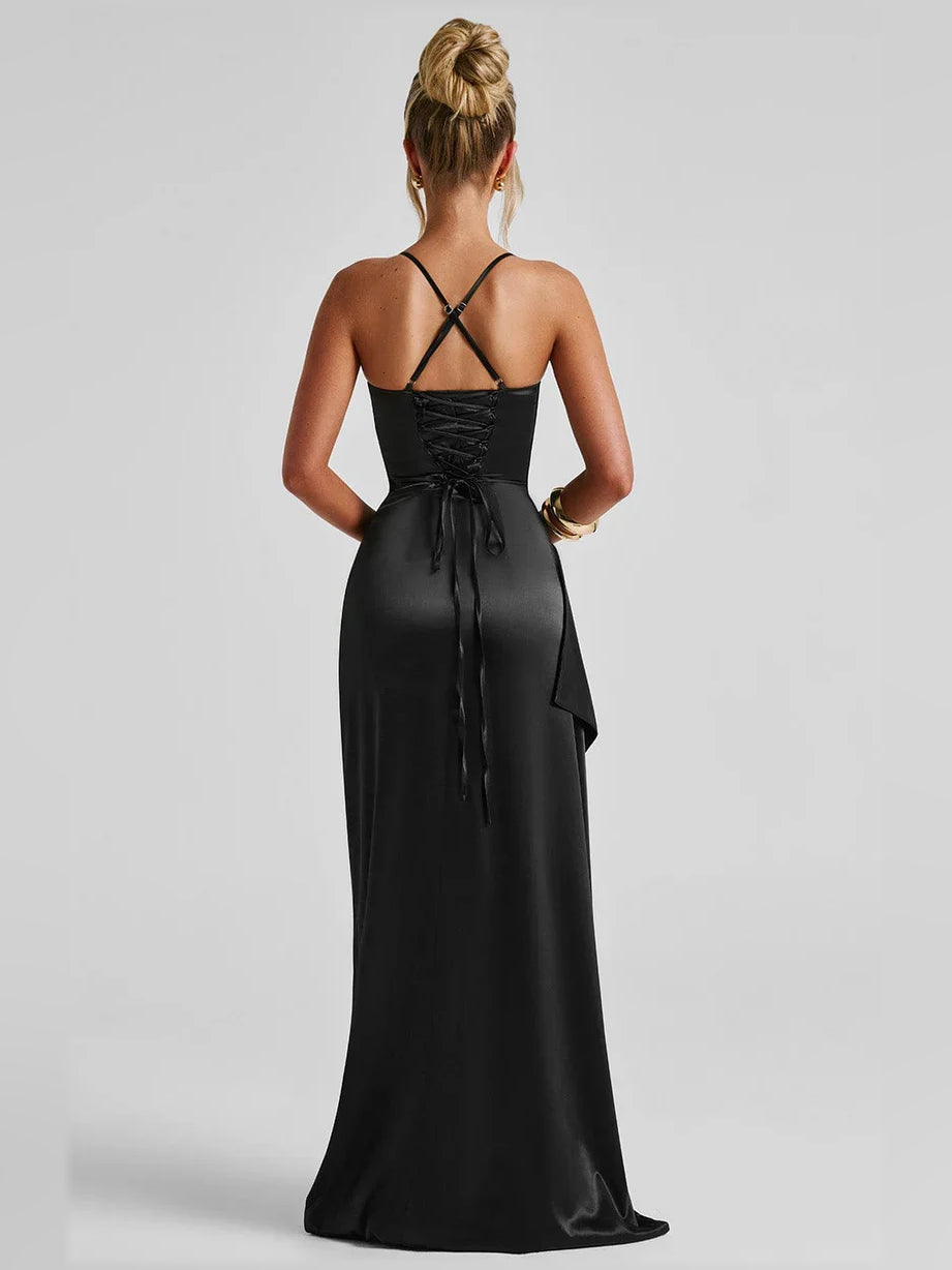 Black satin cowl-neck formal dress with ruched details and back tie straps