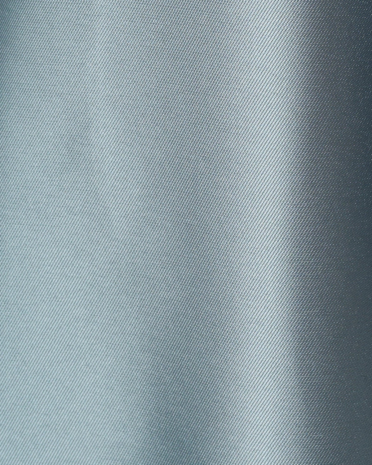 Ice blue textured fabric swatch with fine woven pattern