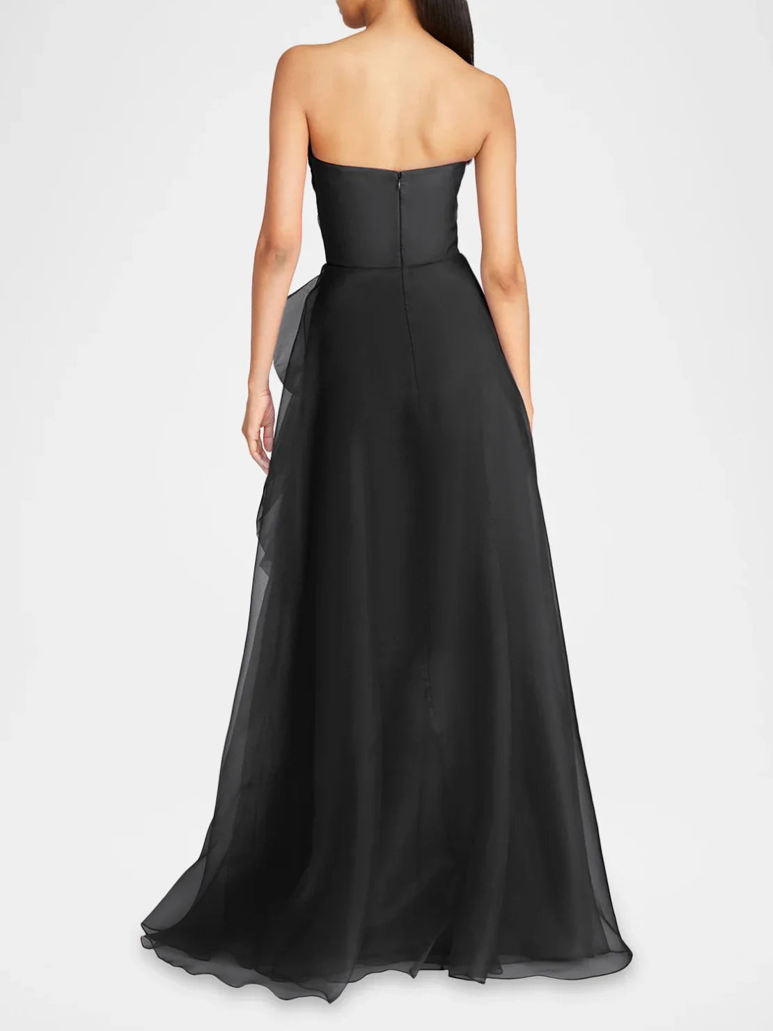 Black strapless A-line formal dress with full tulle skirt, back view.
