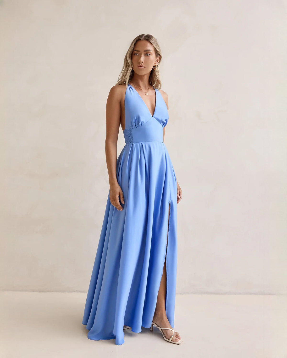 Periwinkle blue chiffon maxi dress with V-neck, wrap-style bodice, and side slit