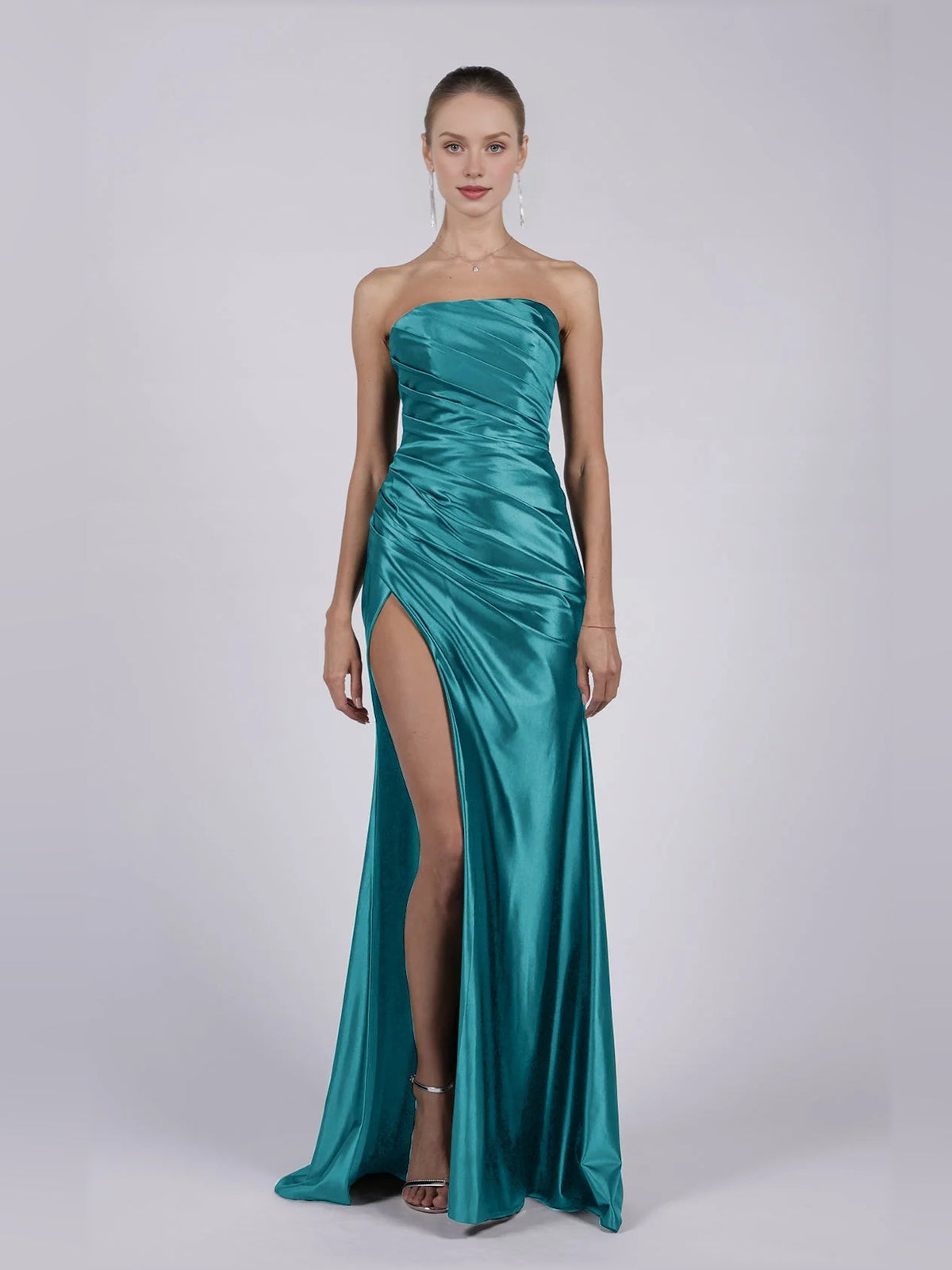 Strapless mermaid formal dress in teal with ruched bodice and thigh-high slit