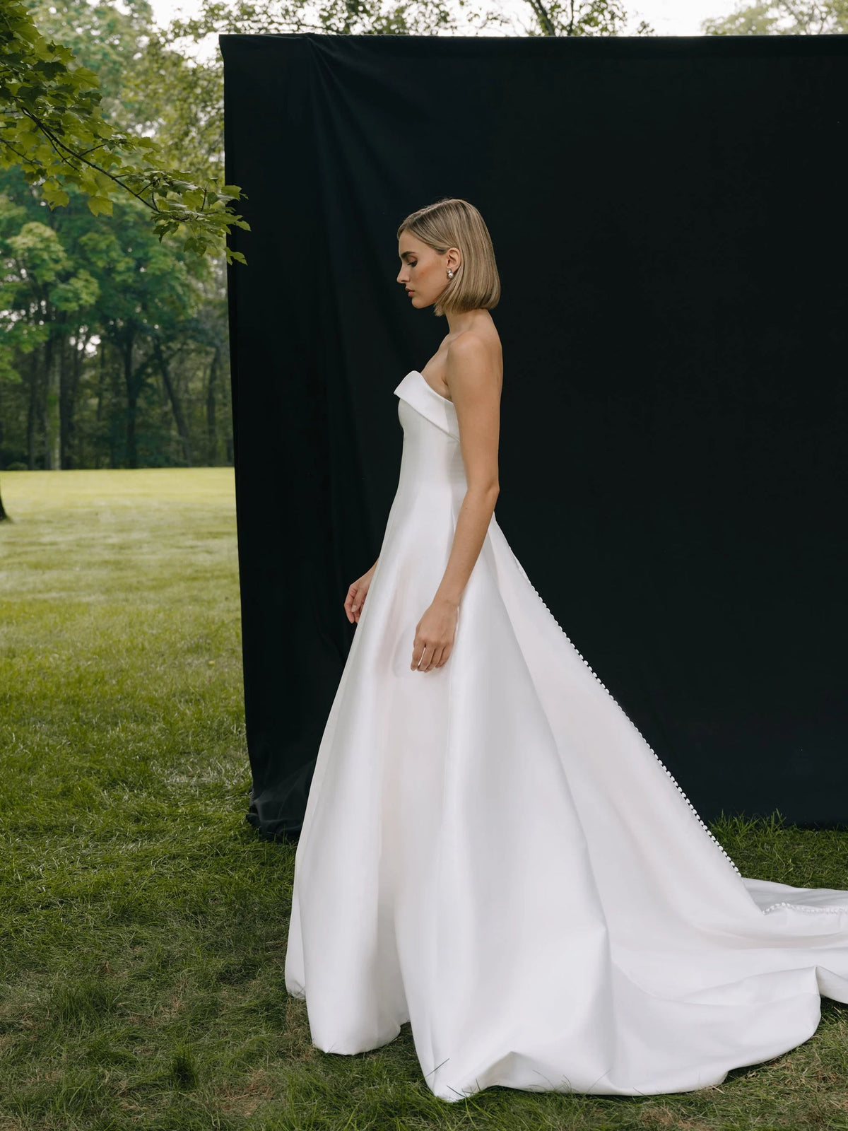 Ivory strapless A-line wedding dress with soft drape, floor-length satin