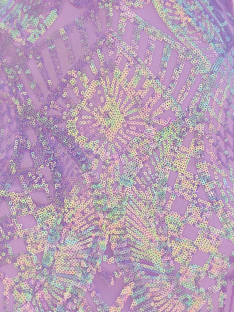 Lilac sequin fabric with dense iridescent shimmer and decorative pattern