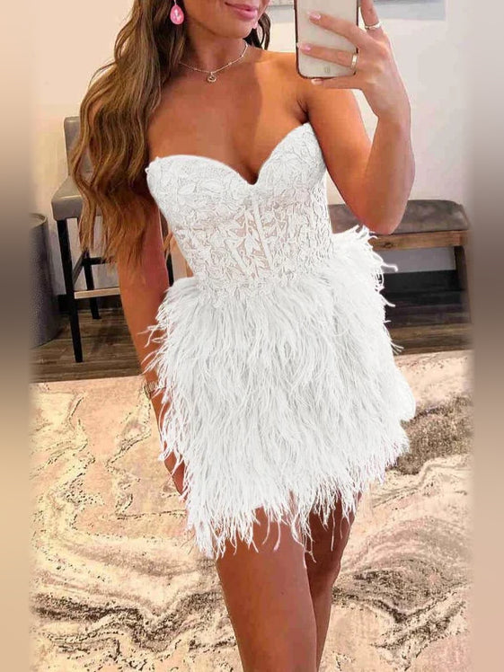 White sweetheart corset mini dress with lace bodice and feather fringe skirt