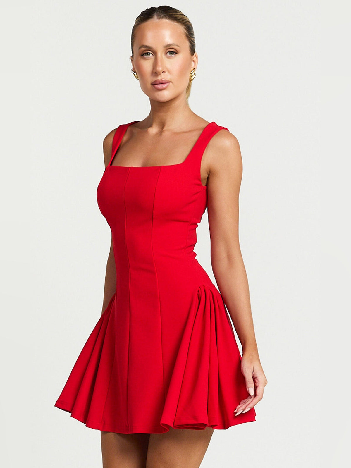 Red sleeveless fit-and-flare mini dress with square neckline and princess seams