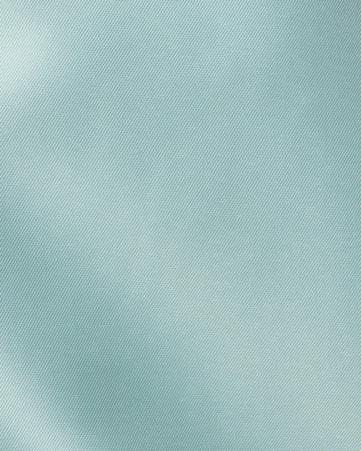 Pale aqua woven fabric close-up with fine diagonal texture