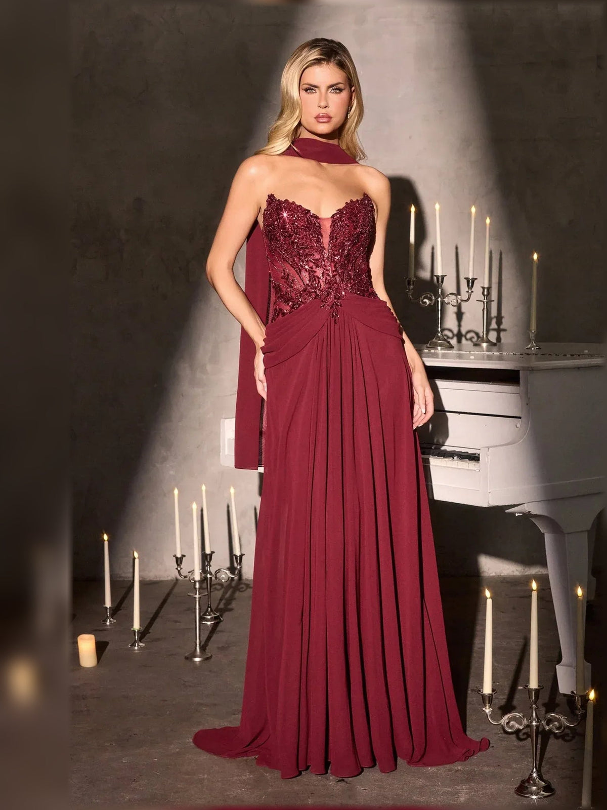 Burgundy strapless A-line chiffon gown with beaded sweetheart bodice and pleated skirt