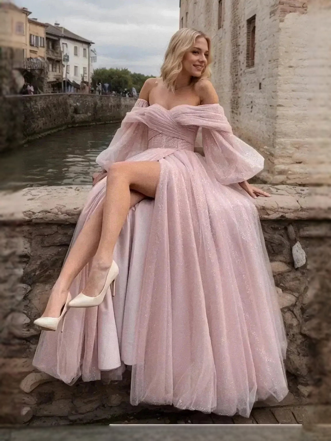Blush pink off-shoulder corset prom dress with voluminous tulle skirt and slit